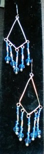 Earrings, silver large diamond w/hanging blue glass seed beads.$12.00
