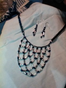 Beaded necklace and earring set-23". $25.00